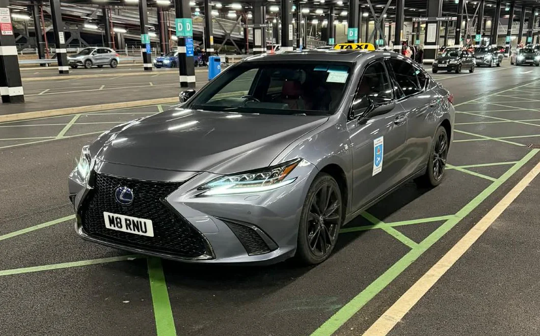 Grey Lexus ES300h F Sport operated by Find My Cab